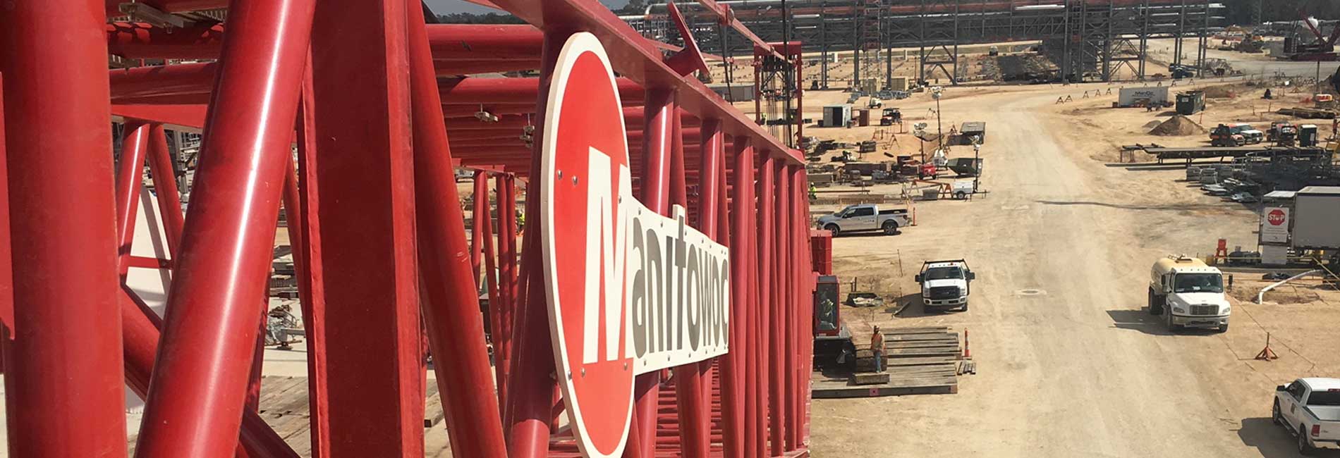 Manitowoc boom crane at a construction site