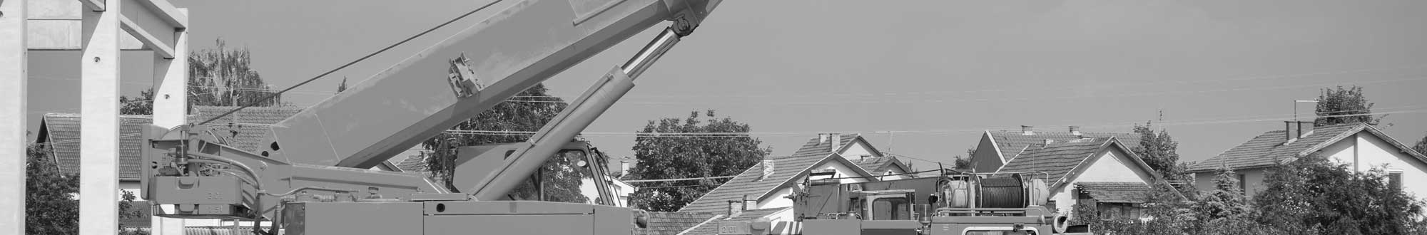 old crane in residential neighborhood